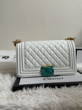 CHANEL White Quilted Shoulder Bag with Green Accent